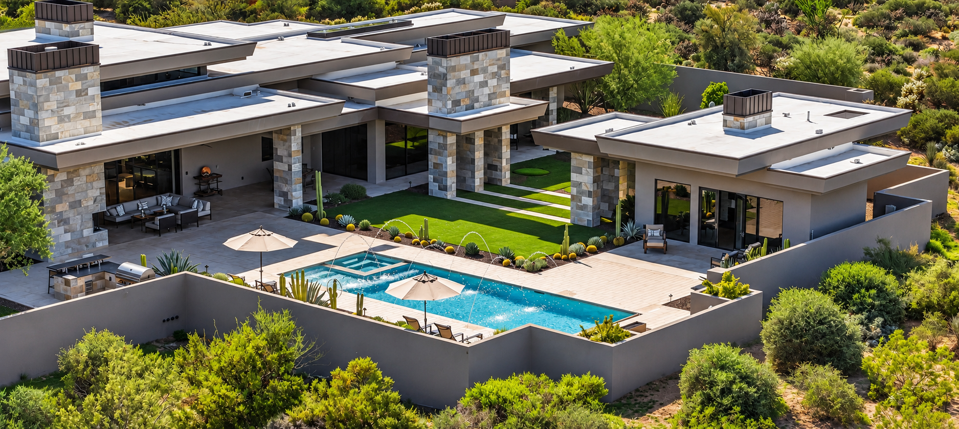 Drone view of the rear pool, lawn and covered patios at Collina in Scottsdale, Arizona